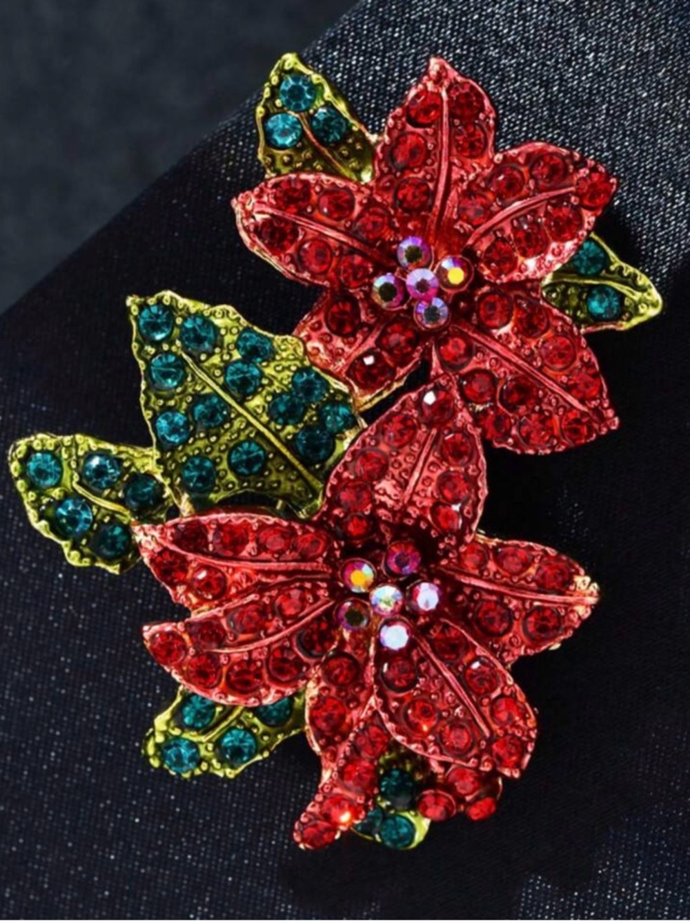 Red Crystal Poinsettia Flower Brooch with Green Accents
